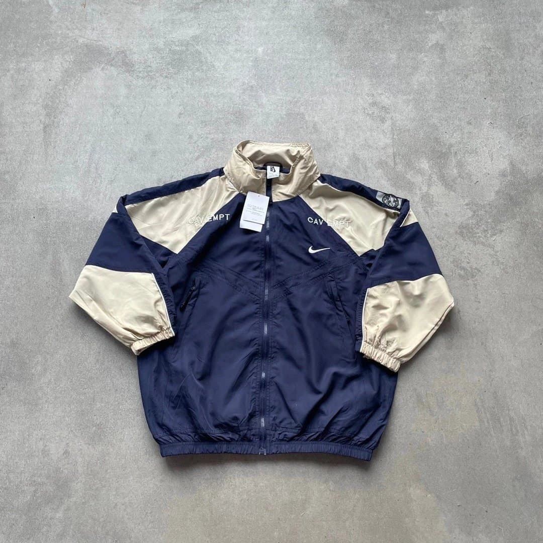 Original CAVEMPT ce CE vintage nylon jacket co-branded nylon retro color matching sports jacket assault jacket school uniform sportswear hooded windbreaker top stitching khaki navy blue hat can be stored - OrientDig Spreadsheet